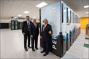 Energy Secretary Ernest Moniz, right, joins NREL Director Dan Arvizu, center, and NREL Computational Science Center Director Steve Hammond, left, at the unveiling of Peregrine. 