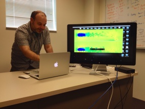 Josh Levine shows how GPUs work in his McAdams Hall office at Clemson University.