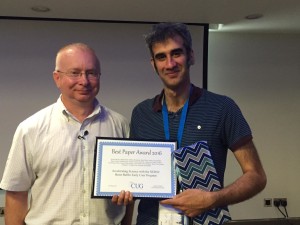 Wahid Bhimji (right) accepted the award on behalf of the NERSC team that authored the paper.