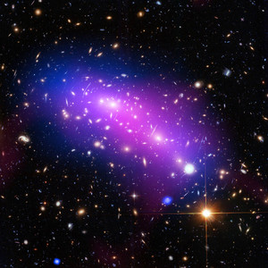 Galaxy clusters, which contain a significant amount of dark matter. In this image, the dark matter appears to align well with the blue-hued hot gas. (Image: NASA)
